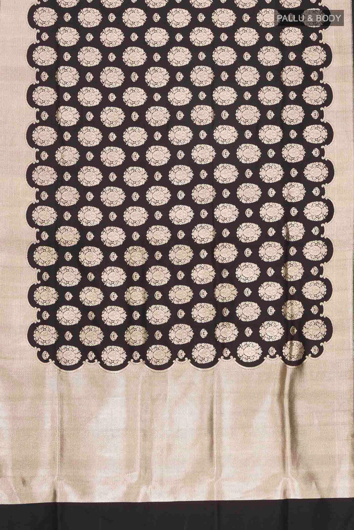Flat view of Black Banarasi Silk Saree with Zari Butta on the body and Zari Border