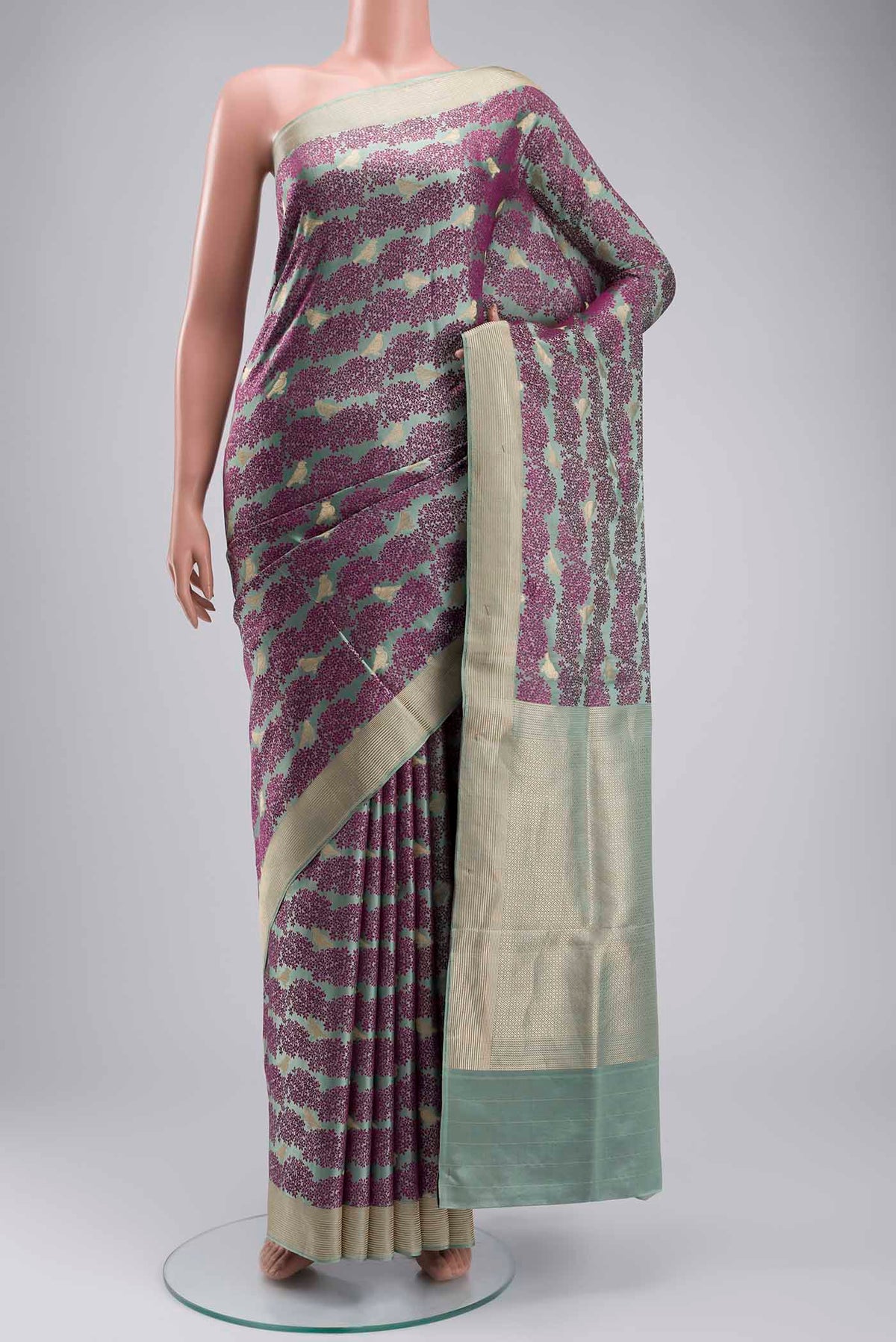 Sea Green Banarasi Silk Saree with Jacquard With Zari Butta on the body and Zari Border displayed on a mannequin