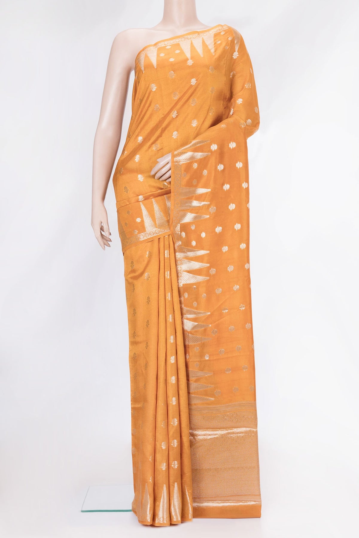 Gold Dual Tone Banarasi Raw Silk Saree with Zari Butta on the body and Fancy Border.  displayed on a mannequin