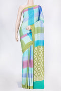 Sky Blue, Pink and Green Color Tussar Silk Saree with Printed design on the body and Zari Border displayed on a mannequin