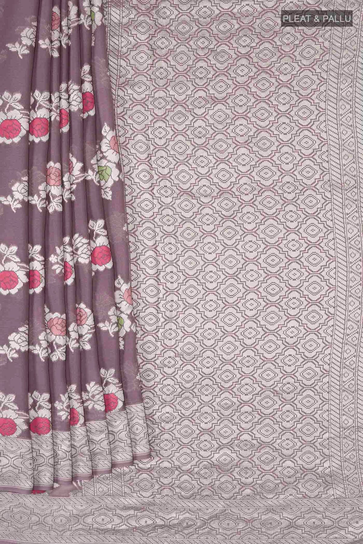 Pleats and pallu of Lilac Banarasi Georgette Saree with Zari Butta on the body and Zari Border