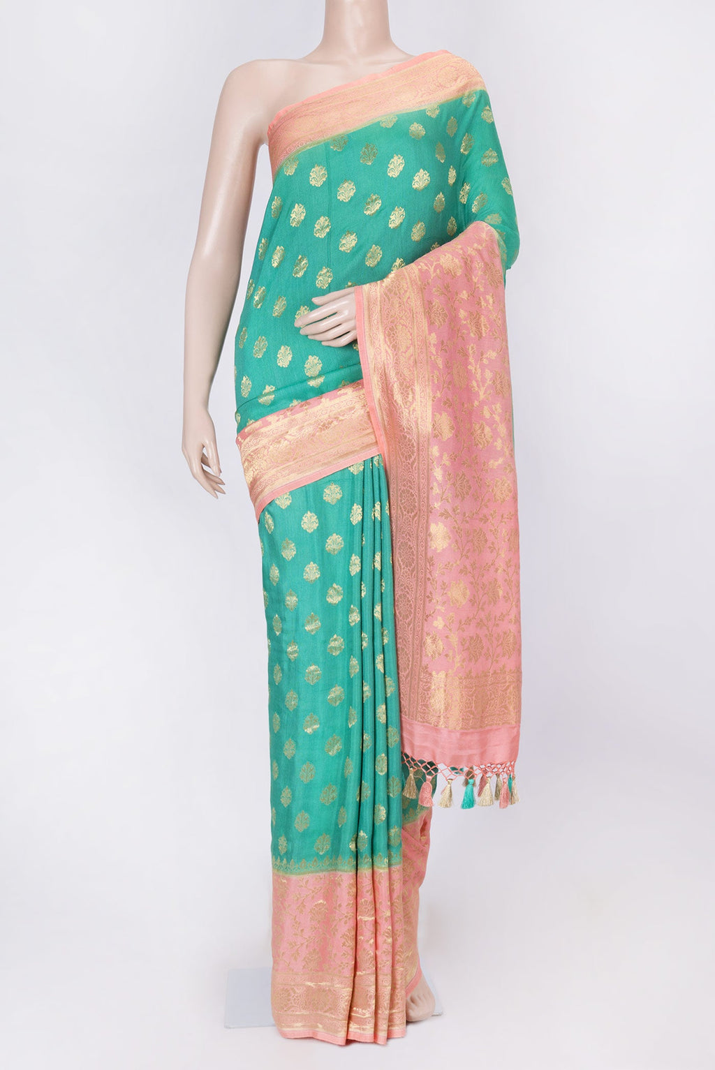 Green Dual Tone Banarasi Silk Saree with Zari Brocade on the body and Zari Border displayed on a mannequin