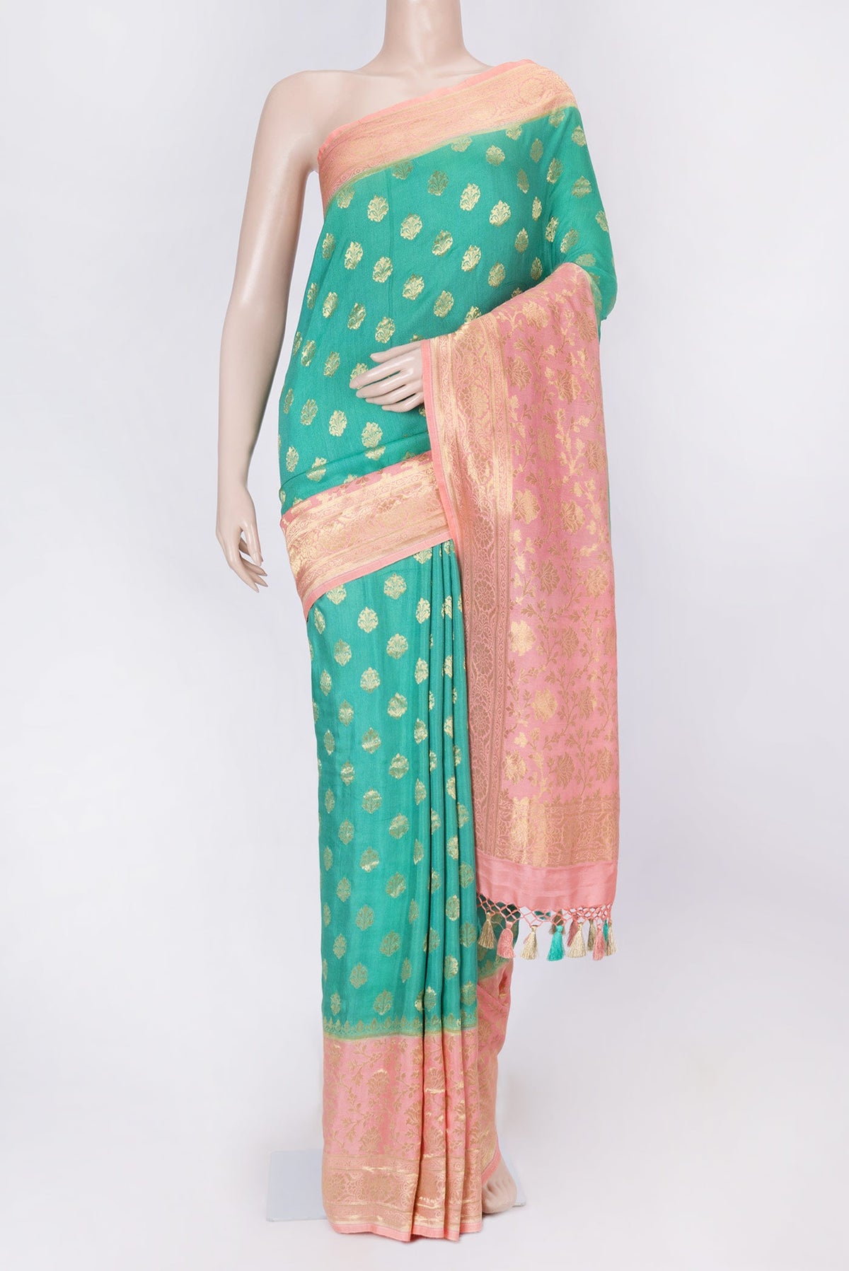 Green Dual Tone Banarasi Silk Saree with Zari Brocade on the body and Zari Border displayed on a mannequin