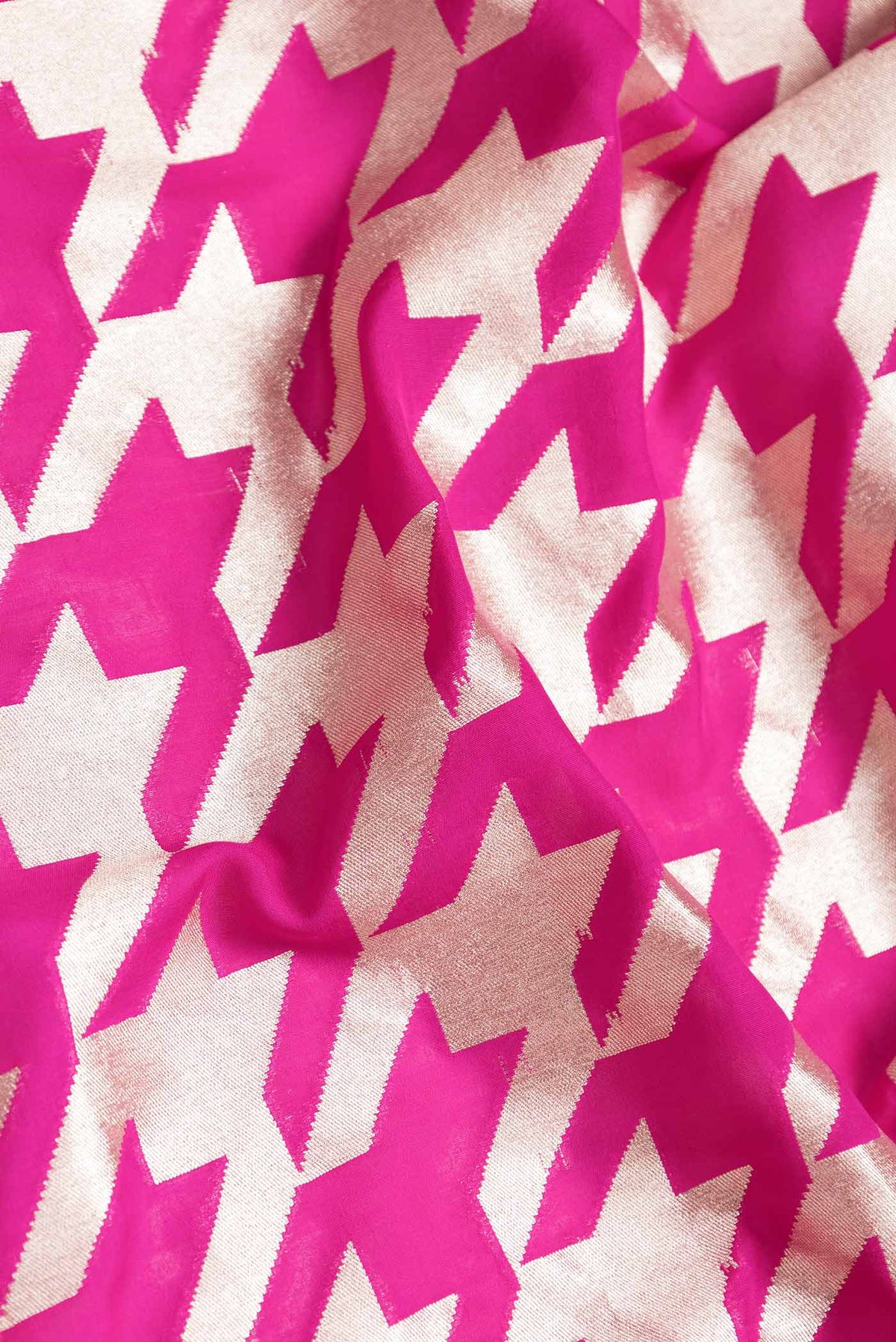 Close up of Pink Dual Tone Banarasi Saree with Zari Brocade on the body and Zari Border.  displaying folds
