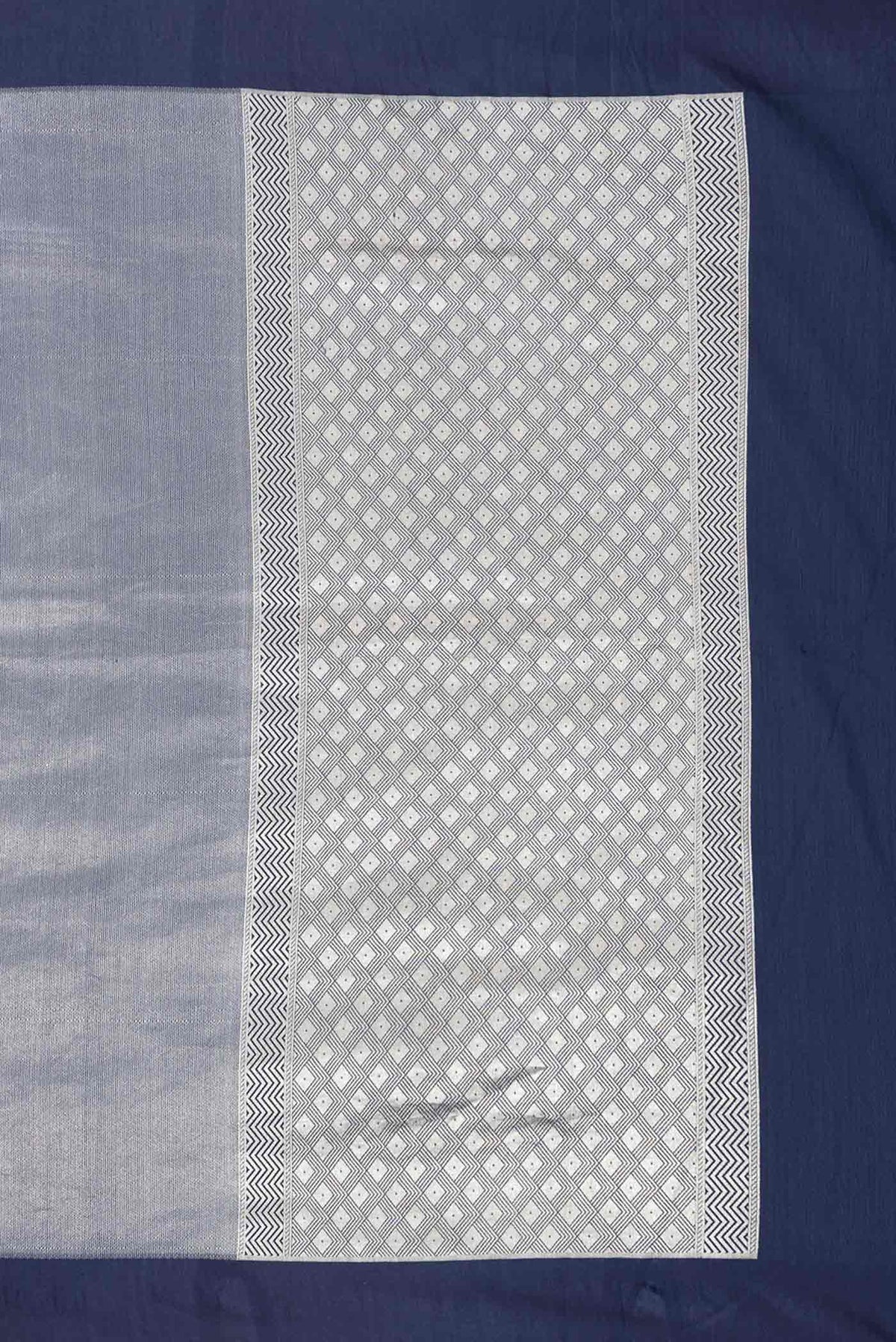 Close up image of the pallu of Navy Blue Dual Tone Banarasi Silk Saree with Zari Brocade on the body and Plain Border