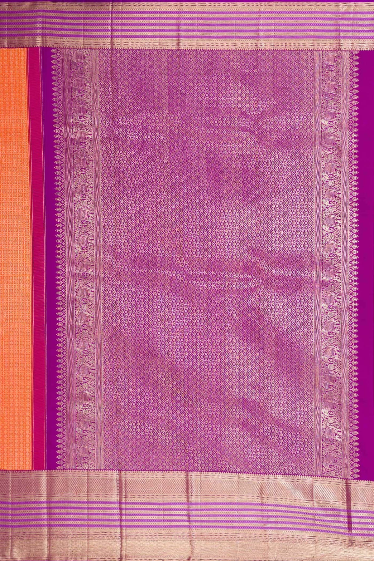 Close up image of the pallu of Brick Orange Dual Tone Kanchipuram Silk Saree with Zari Brocade on the body and Zari Border. 