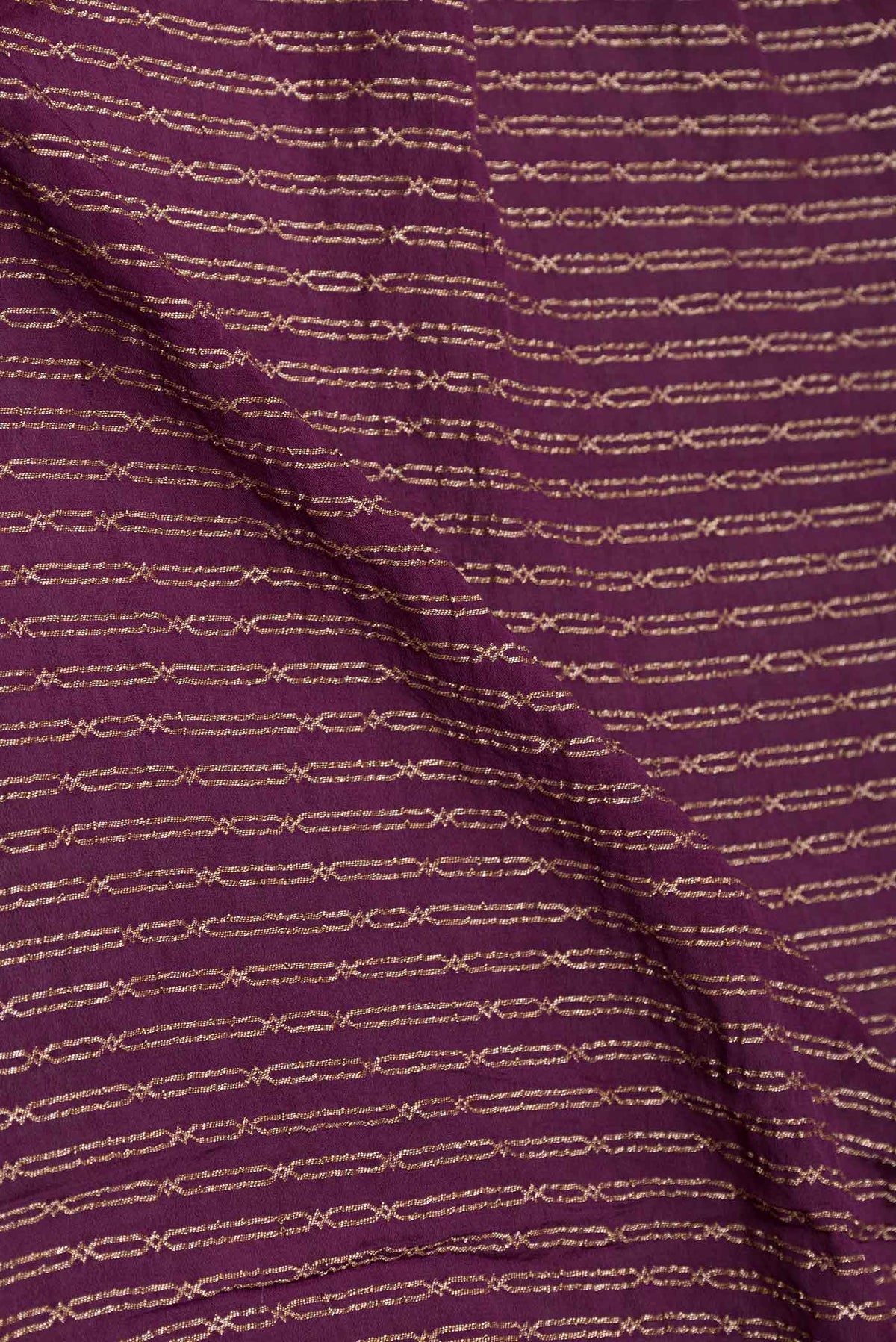 Close up of Purple Mysore Crepe Saree with Stripes on the body and Thin Zari Line displaying folds