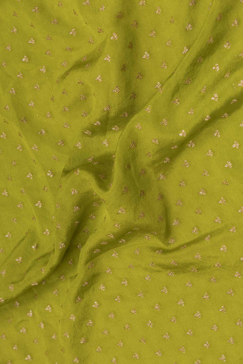 Close up of Parrot Green Dual Tone Banarasi Georgette Saree with Zari Brocade on the body and Zari Border displaying folds
