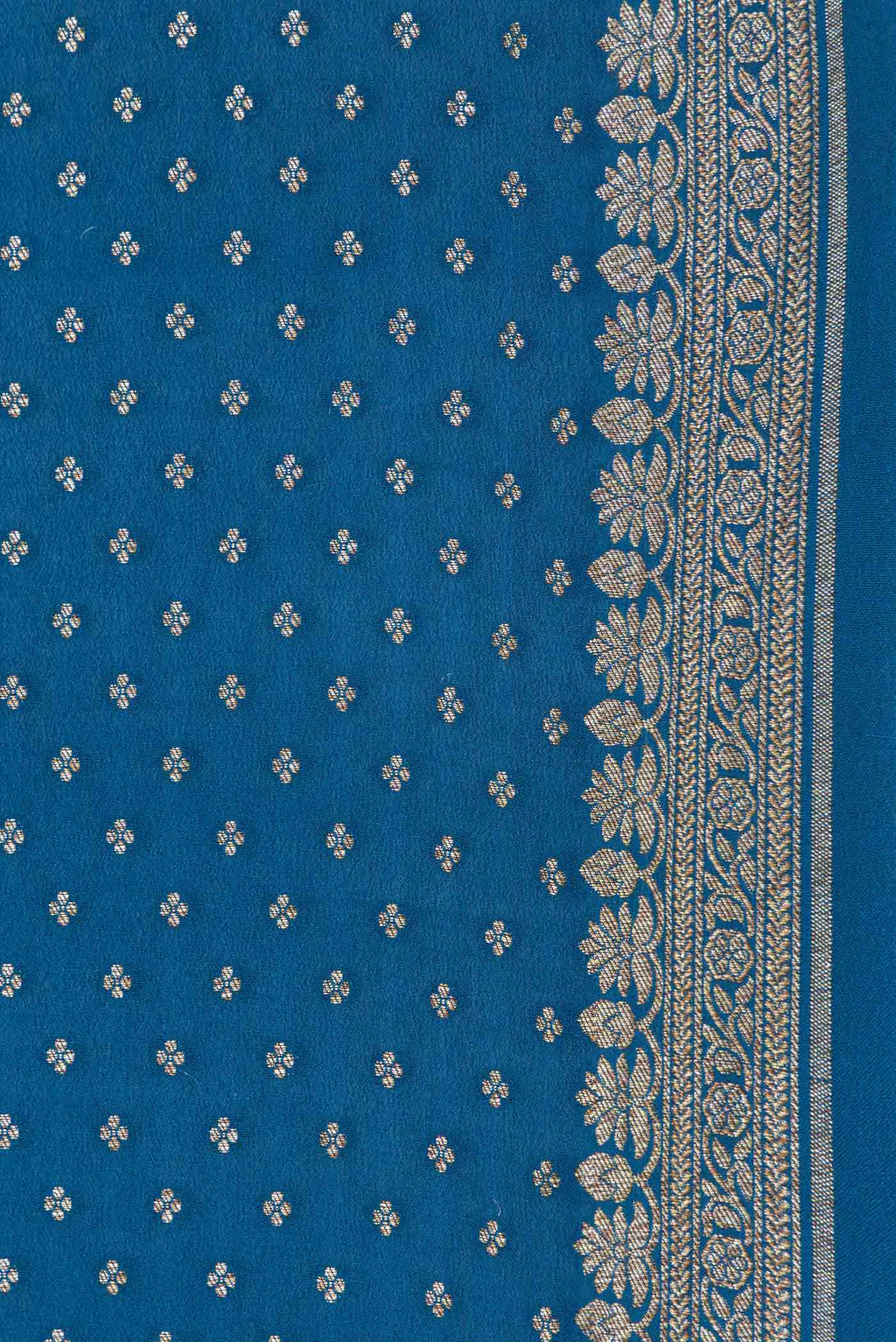 Border image of Peacock Blue Dual Tone Georgette Saree with Zari Butta on the body and Zari Border