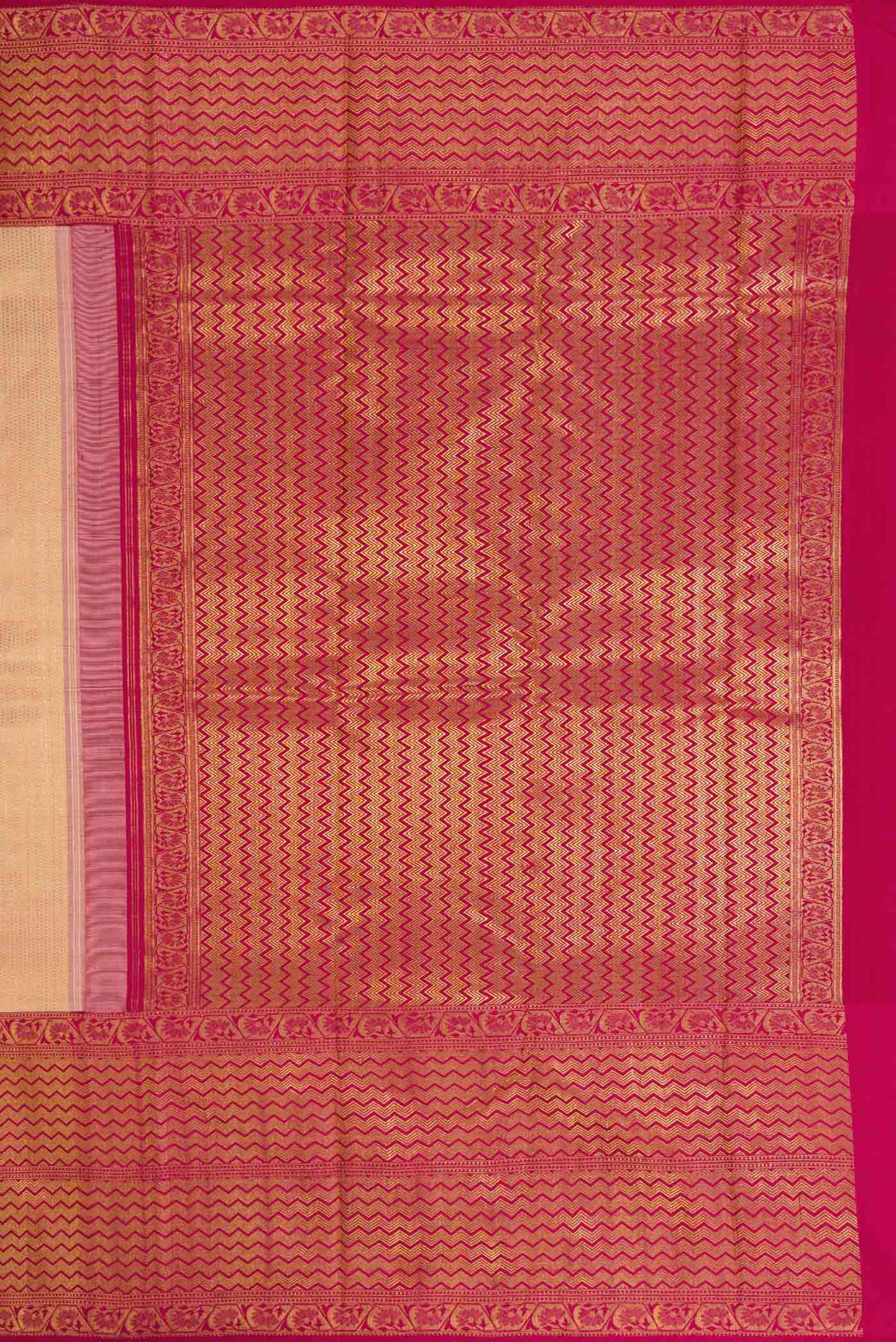 Close up image of the pallu of Rose Gold Kanchipuram Silk Saree with Zari Brocade on the body and Zari Border