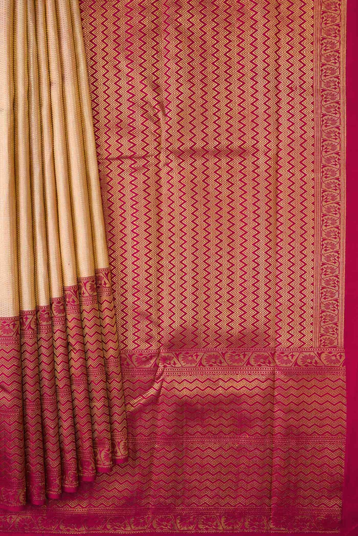 Pleats and pallu of Rose Gold Kanchipuram Silk Saree with Zari Brocade on the body and Zari Border
