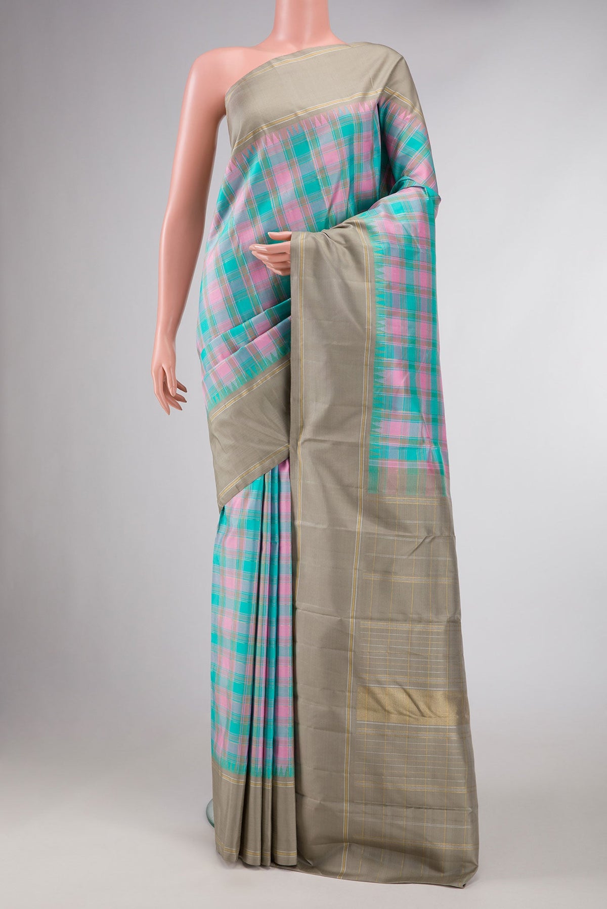 Pure Silk Pure Zari Sky Blue, Pink and Grey Color Kanchipuram Saree with Checked design on the body and Zari Border displayed on a mannequin