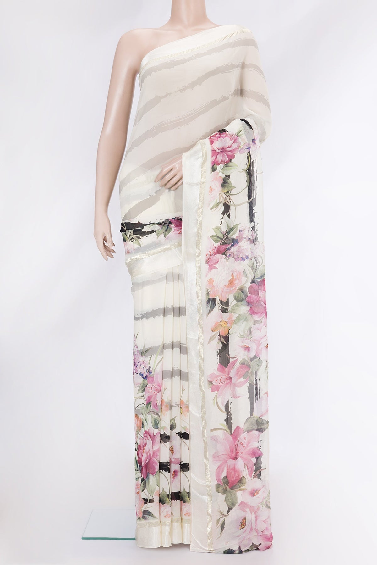 Beige Dual Tone Mysore Crepe Saree with Printed design on the body and Printed Border.  displayed on a mannequin