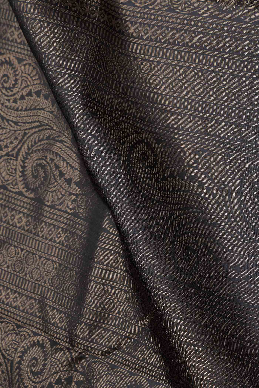 Close up of Black Dual Tone Soft Silk Saree with Zari Brocade on the body and Zari Border.  displaying folds