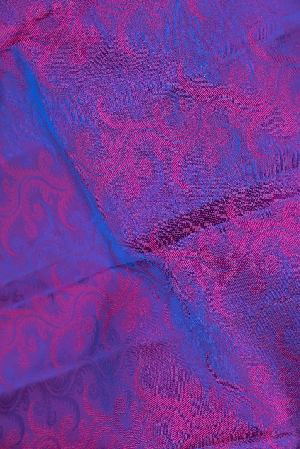 Close up of Purple Dual Tone Kanchipuram Silk Saree with Jacquard design on the body and Zari Border displaying folds