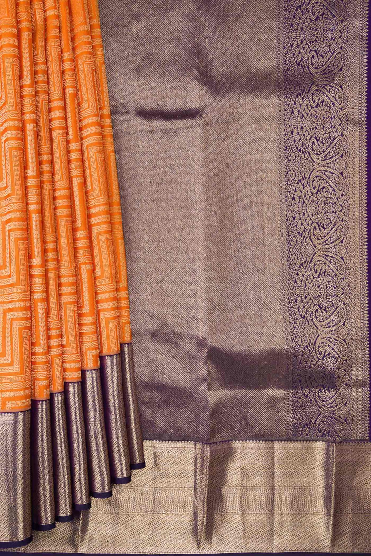 Pleats and pallu of Orange Dual Tone Kanchipuram Silk Saree with Zari Brocade on the body and Zari Border. 