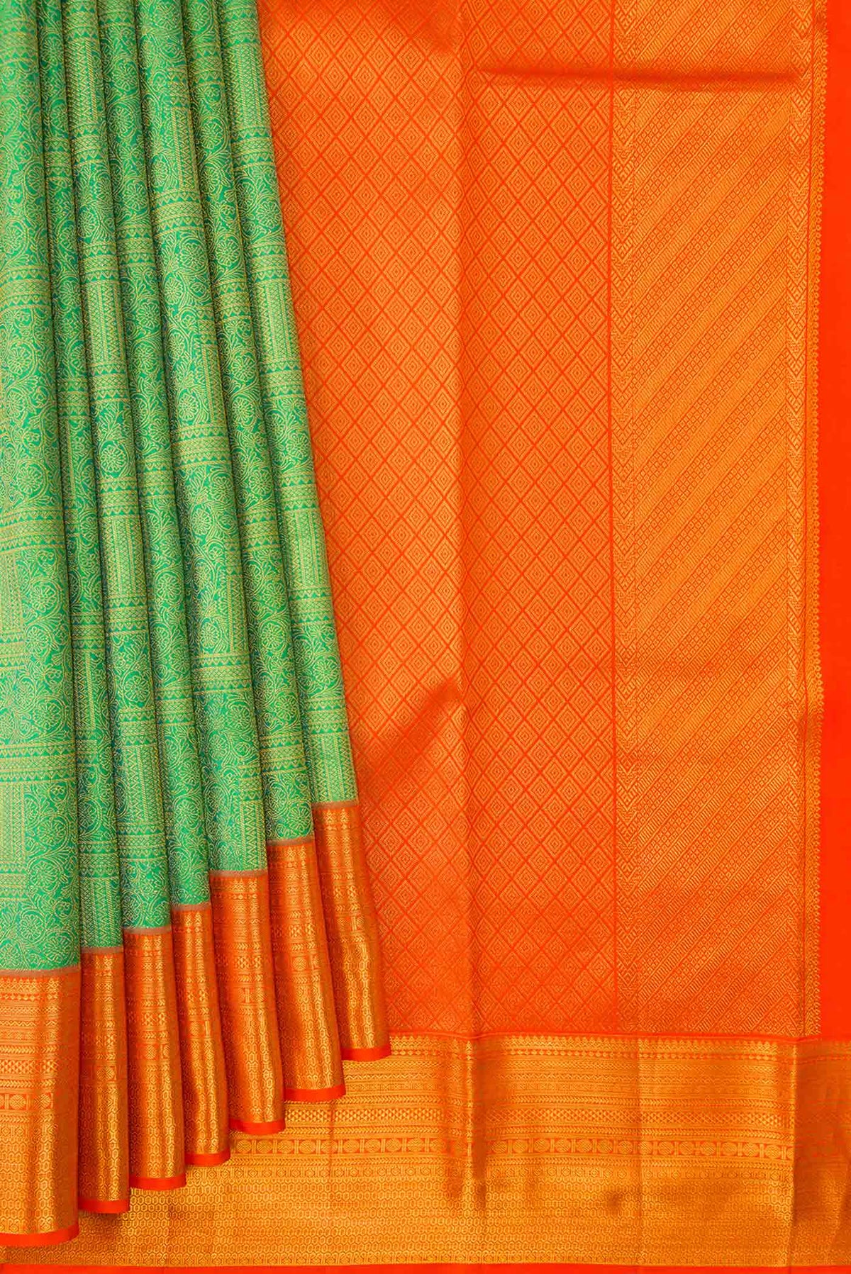 Pleats and pallu of Parrot Green Dual Tone Kanchipuram Silk Saree with Zari Brocade on the body and Zari Border. 