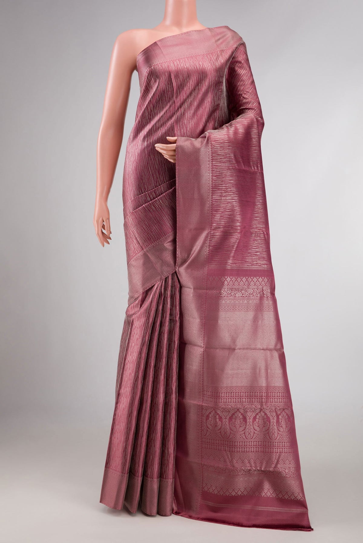Dark Mauve Dual Tone Kanchipuram Silk Saree with Zari Brocade on the body and Zari Border displayed on a mannequin