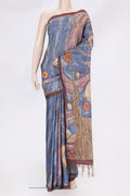 Blue Tussar Silk Saree with Embroidery on the body and Embroidery Border.  displayed on a mannequin