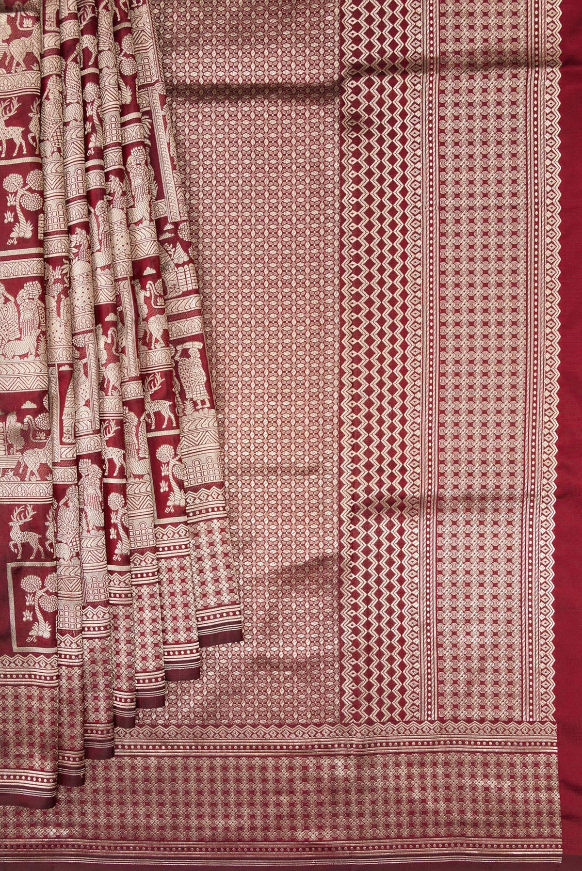 Pleats and pallu of Maroon Dual Tone Banarasi Silk Saree with Zari Brocade on the body and Zari Border. 