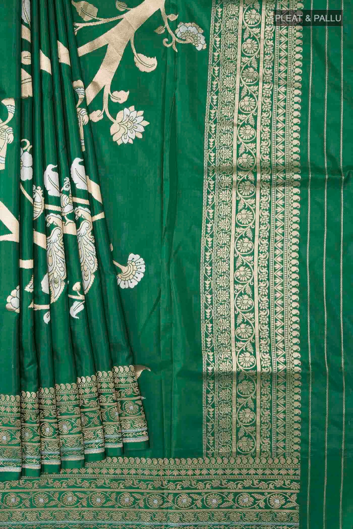 Pleats and pallu of Green Banarasi Silk Saree with Zari Butta on the body and Zari Border