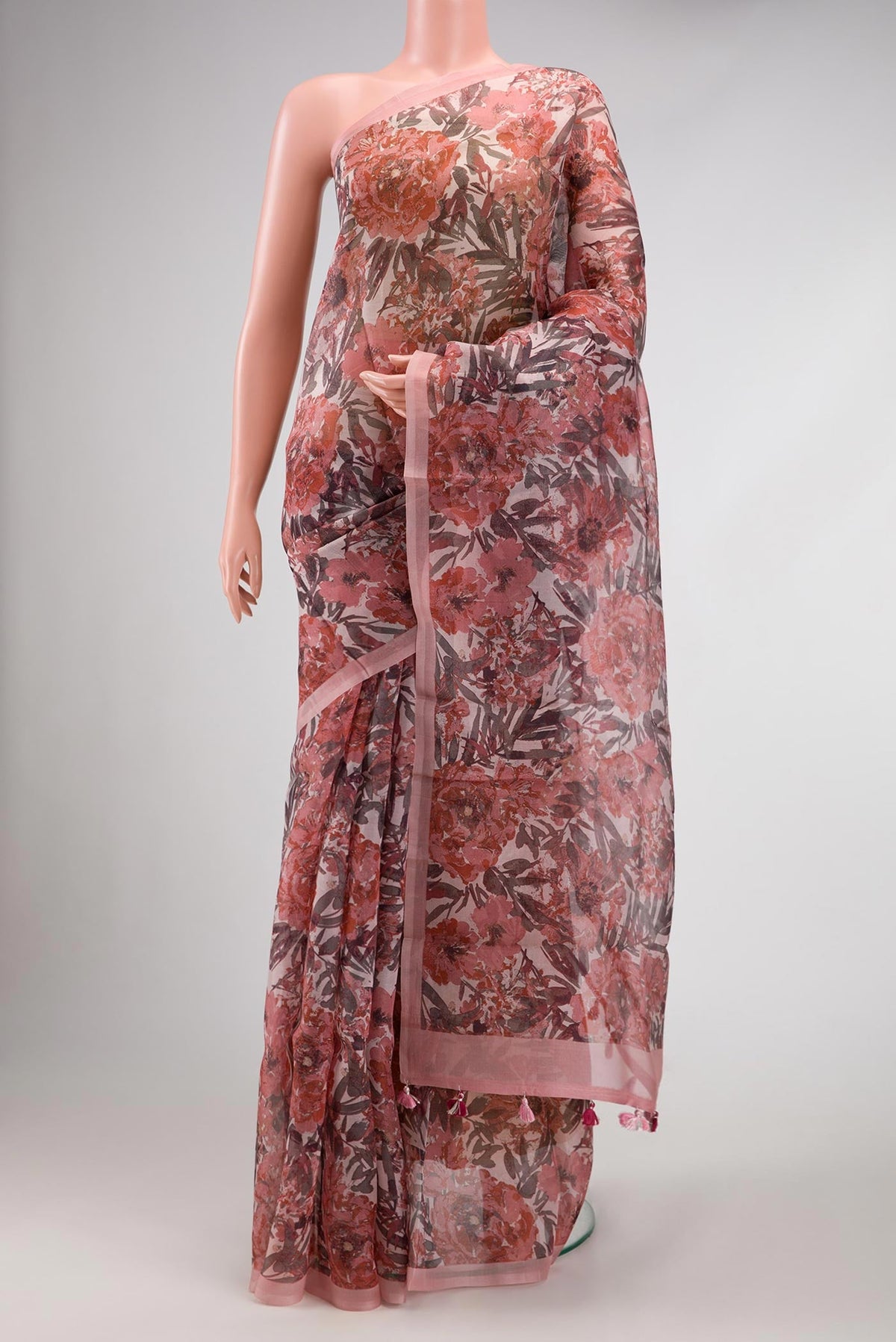 Pink Dual Tone Organza Silk Saree with Printed design on the body and Plain Border.  displayed on a mannequin