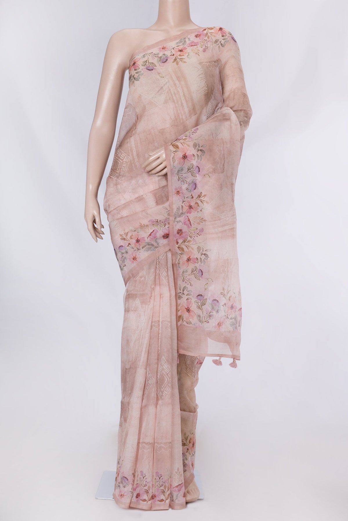 Golden Peach Dual Tone Organza Silk Saree with Printed design on the body and Printed Border displayed on a mannequin