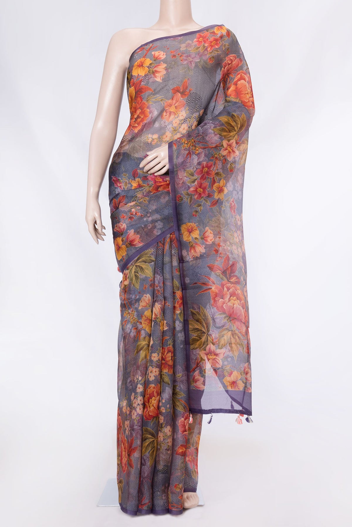 Lavender Dual Tone Organza Silk Saree with Printed design on the body and Without Border displayed on a mannequin