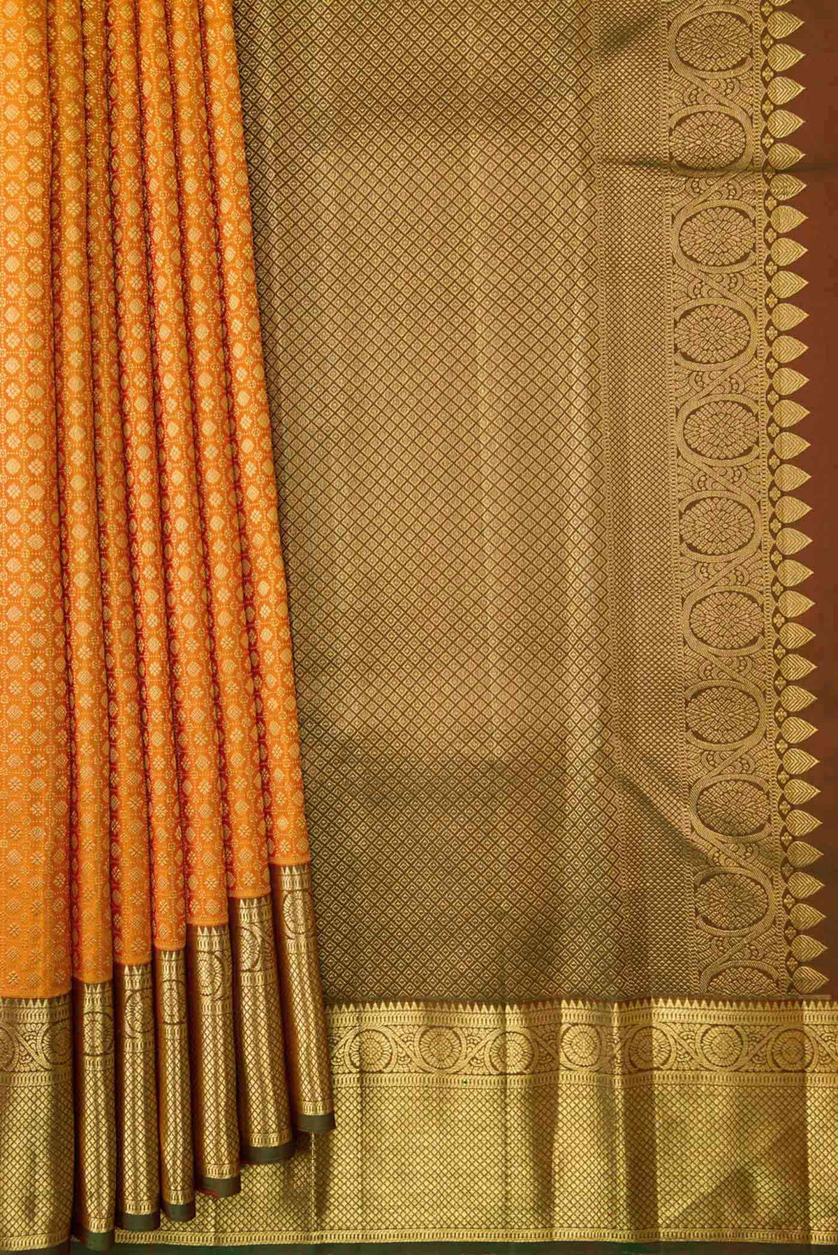 Pleats and pallu of Mustard Dual Tone Kanchipuram Silk Saree with Zari Brocade on the body and Zari Border
