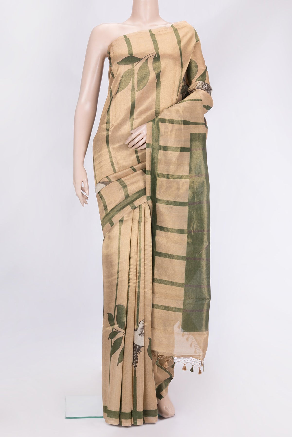 Gold Dual Tone Organza Silk Saree with Zari Brocade on the body and Without Border.  displayed on a mannequin