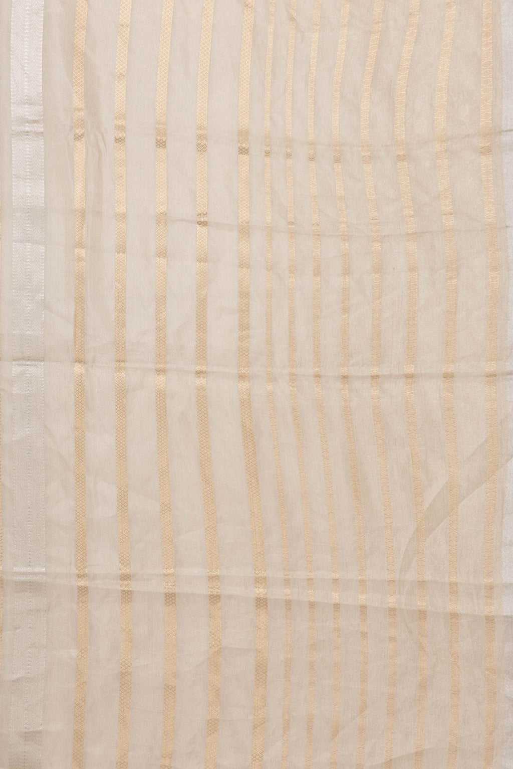 Border image of Gold Dual Tone Organza Silk Saree with Zari Brocade on the body and Zari Border