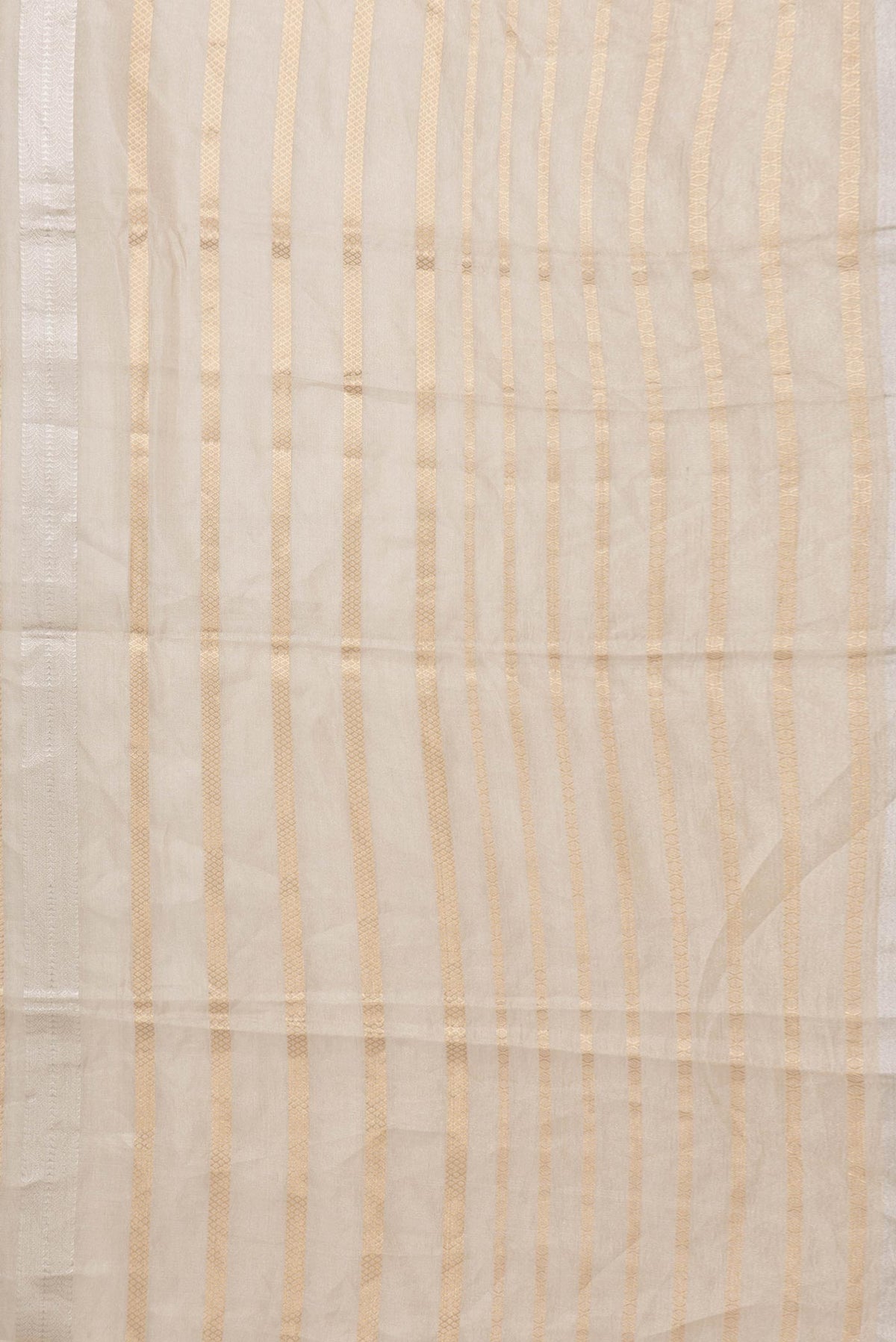 Border image of Gold Dual Tone Organza Silk Saree with Zari Brocade on the body and Zari Border