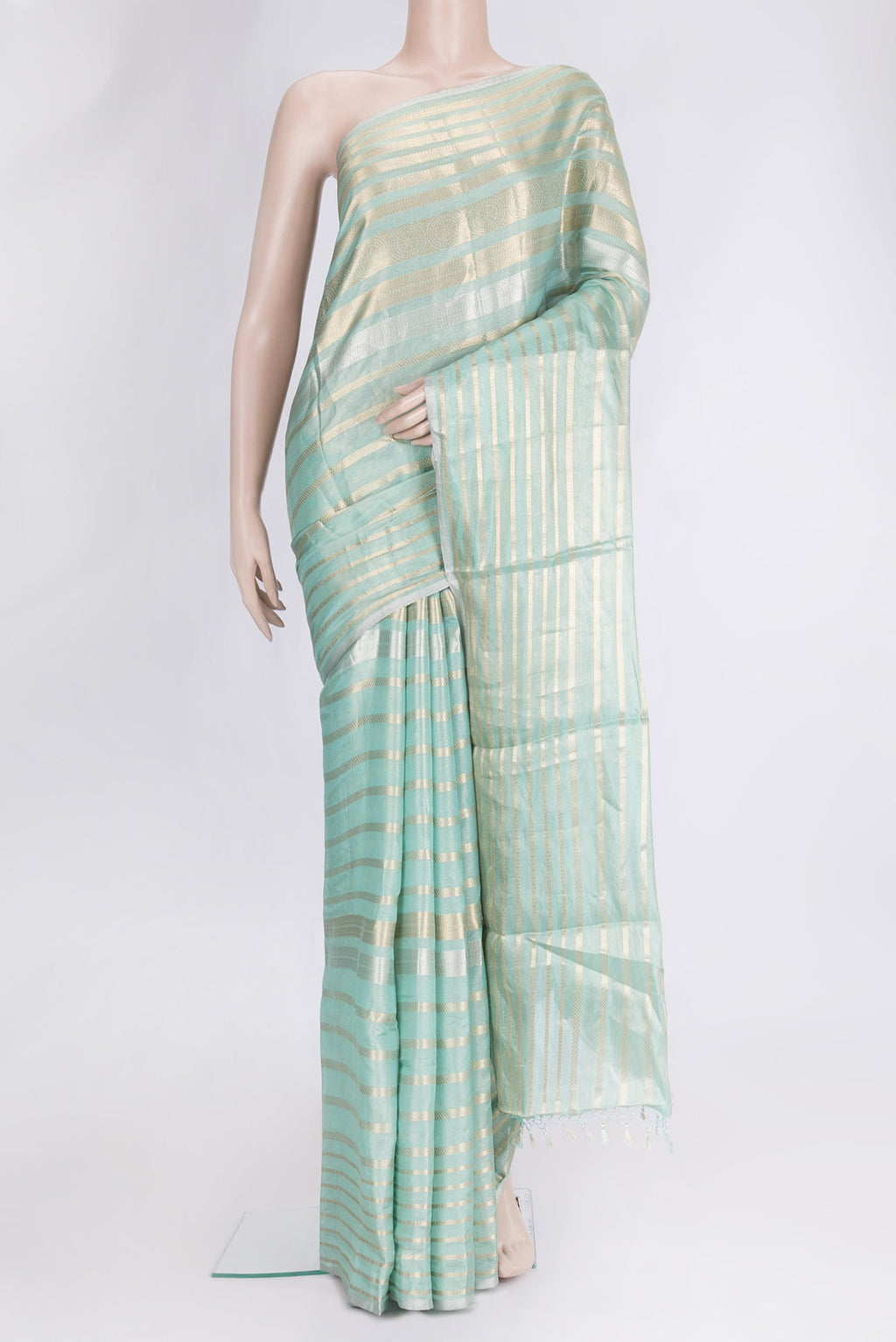 Sea Green Dual Tone Organza Silk Saree with Stripes on the body and Zari Border.  displayed on a mannequin