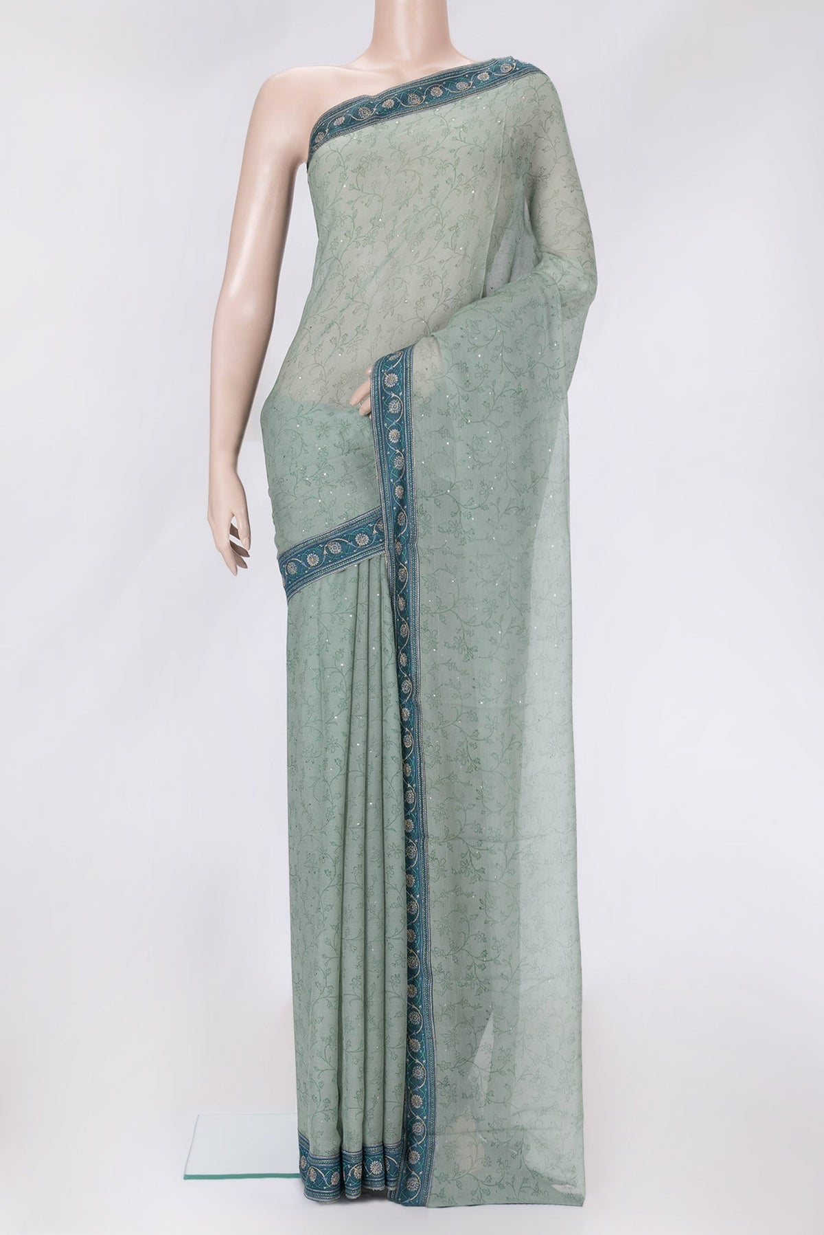 Light Green Dual Tone Mysore Chiffon Saree with Embroidery on the body and Embroidery Border.  displayed on a mannequin