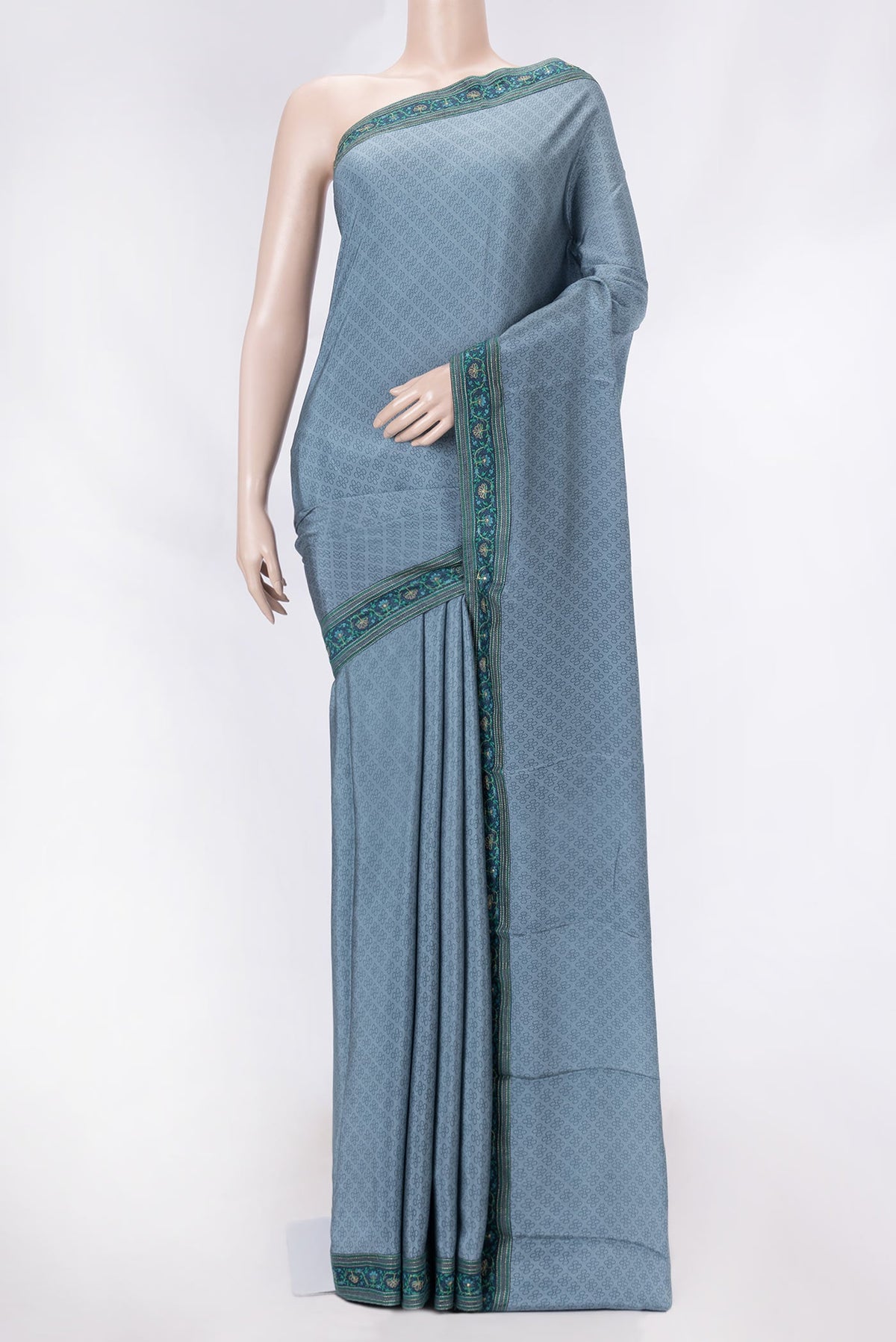 Grey Dual Tone Mysore Crepe Saree with Printed design on the body and Embroidery Border displayed on a mannequin
