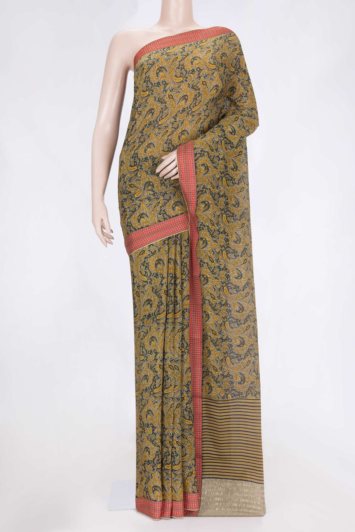 Green Dual Tone Mysore Crepe Saree with Printed design on the body and Thread Border.  displayed on a mannequin