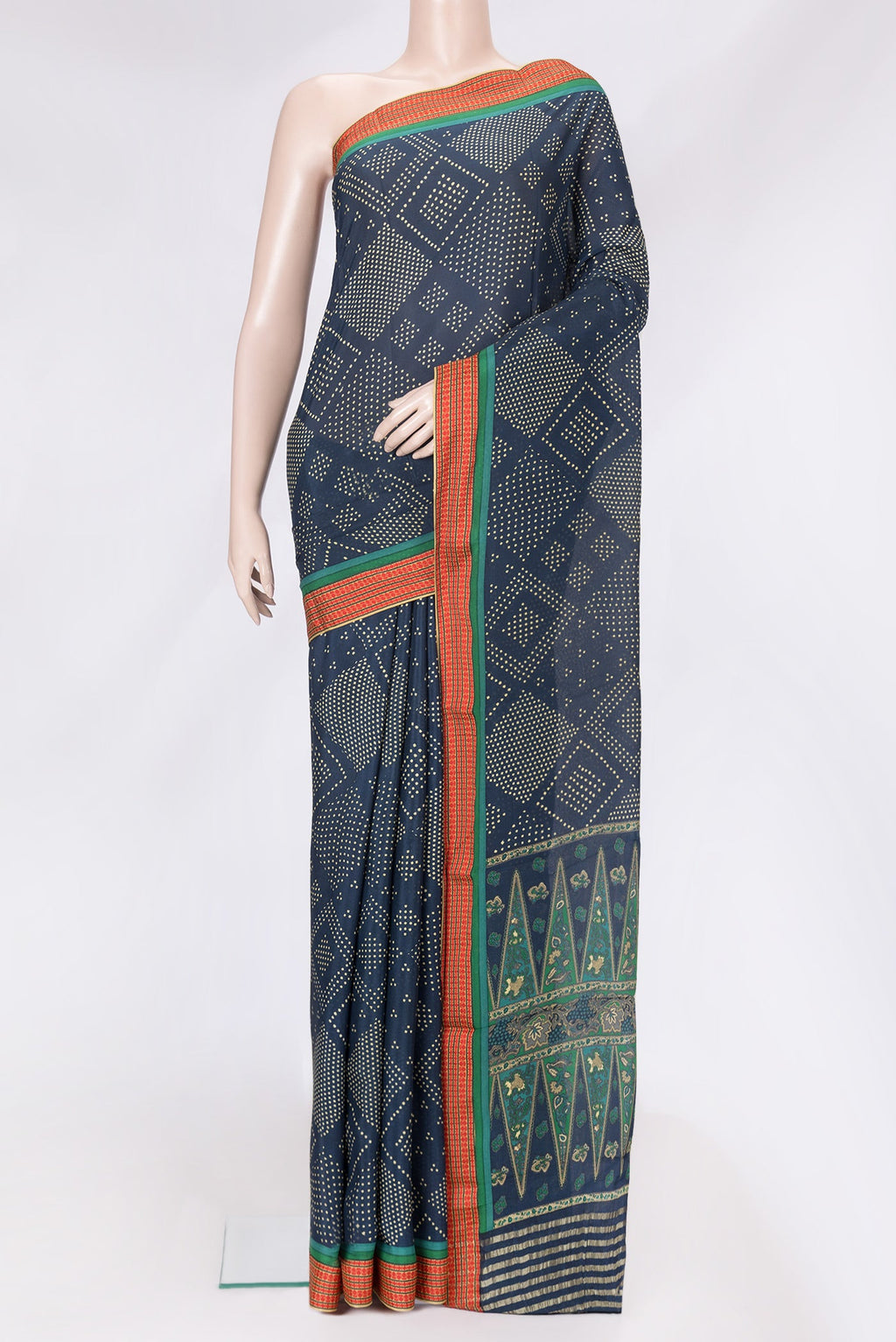 Peacock Blue Dual Tone Mysore Crepe Saree with Printed design on the body and Thread Border.  displayed on a mannequin