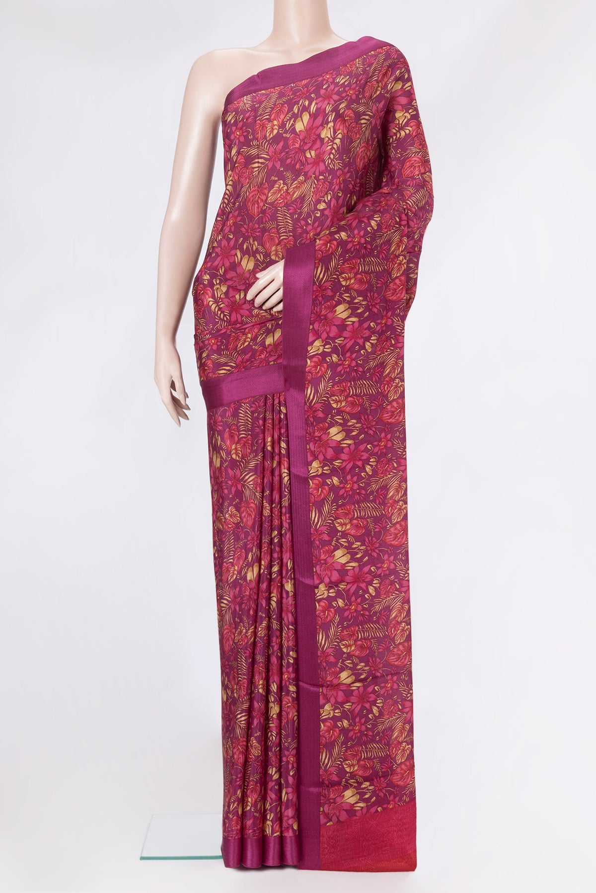 Magenta Dual Tone Crepe Saree with Printed design on the body and Thread Border.  displayed on a mannequin