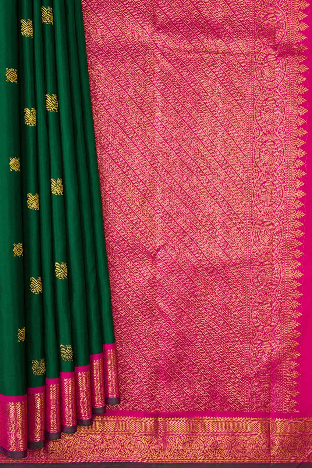 Pleats and pallu of Bottle Green Dual Tone Kanchipuram Silk Saree with Zari Butta on the body and Zari Border