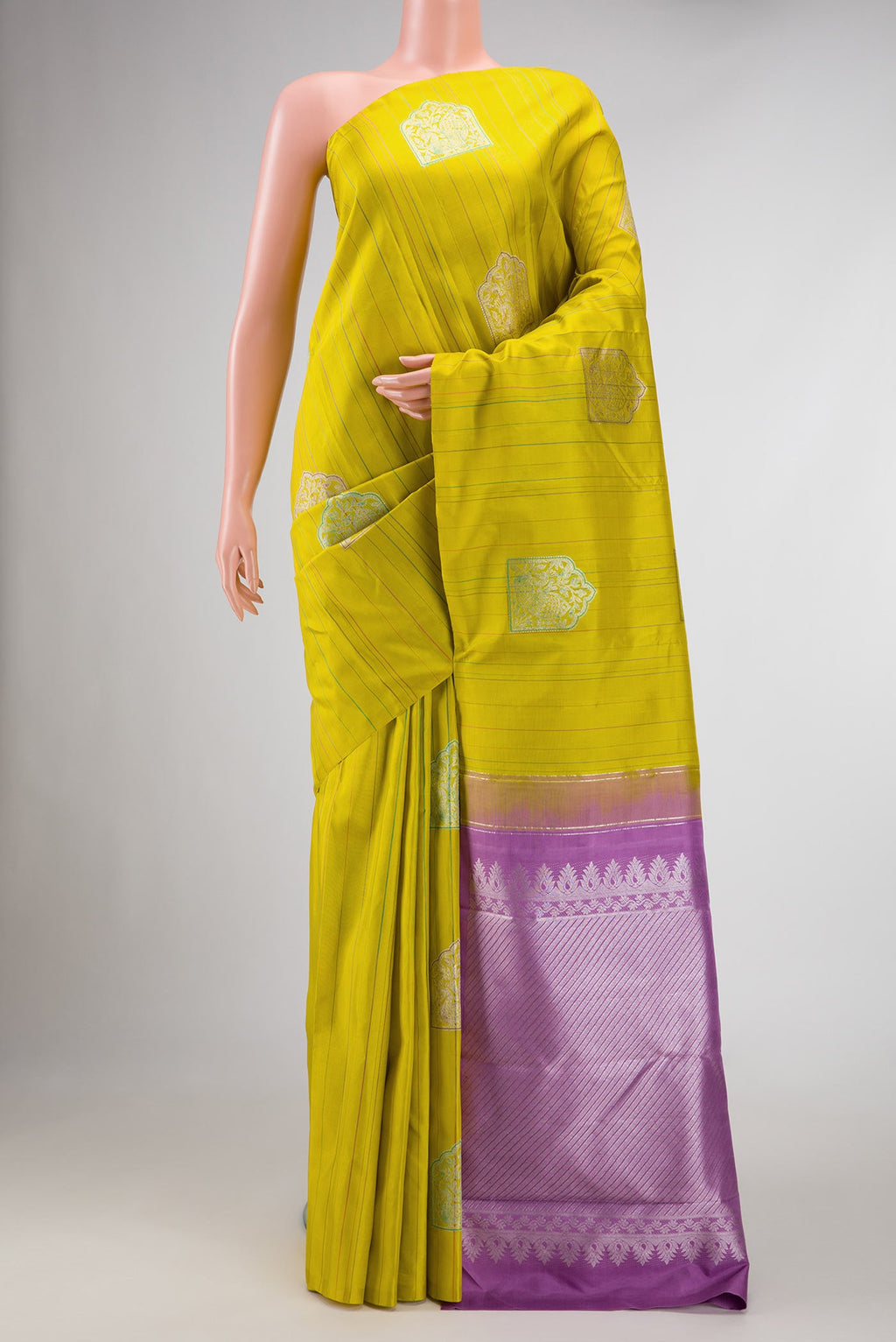Pure Silk Pure Zari Mehandi Green Dual Tone Kanchipuram Saree with Stripes on the body and Without Border displayed on a mannequin