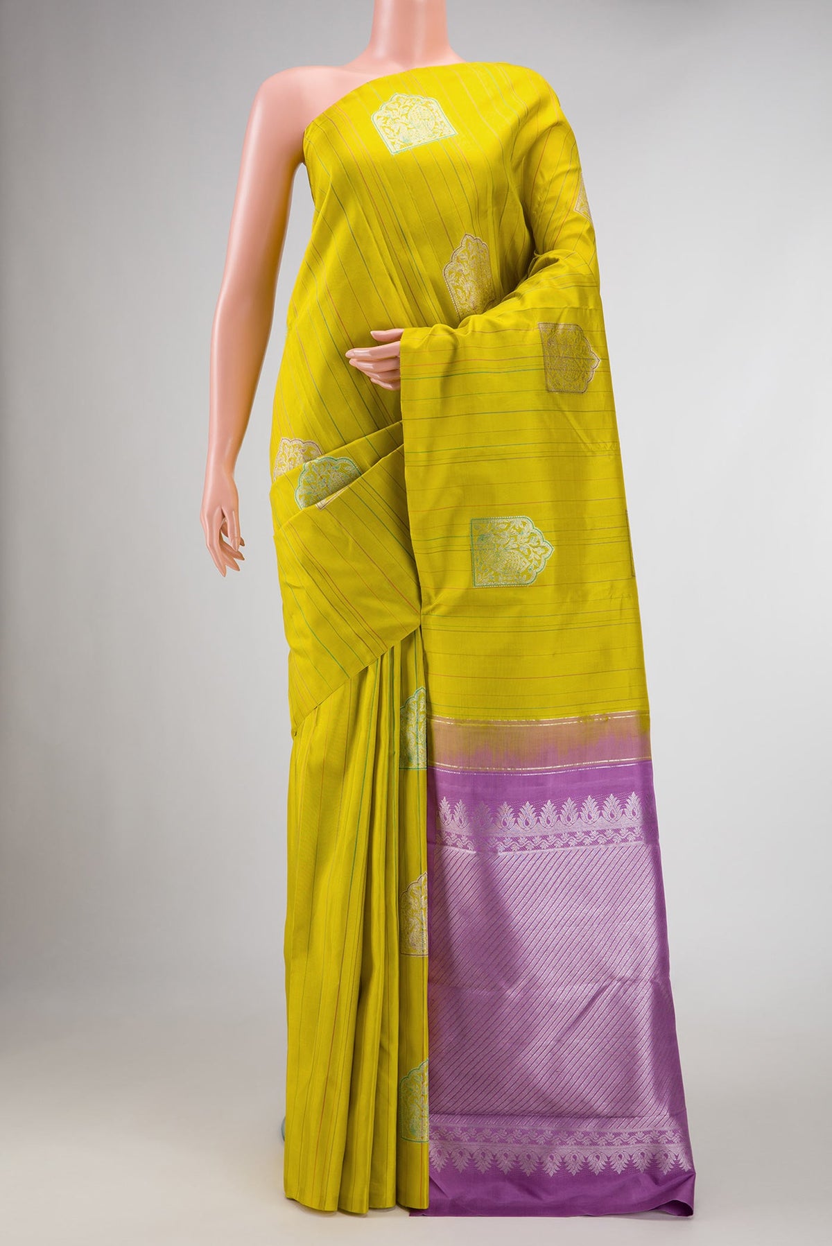 Pure Silk Pure Zari Mehandi Green Dual Tone Kanchipuram Saree with Stripes on the body and Without Border displayed on a mannequin