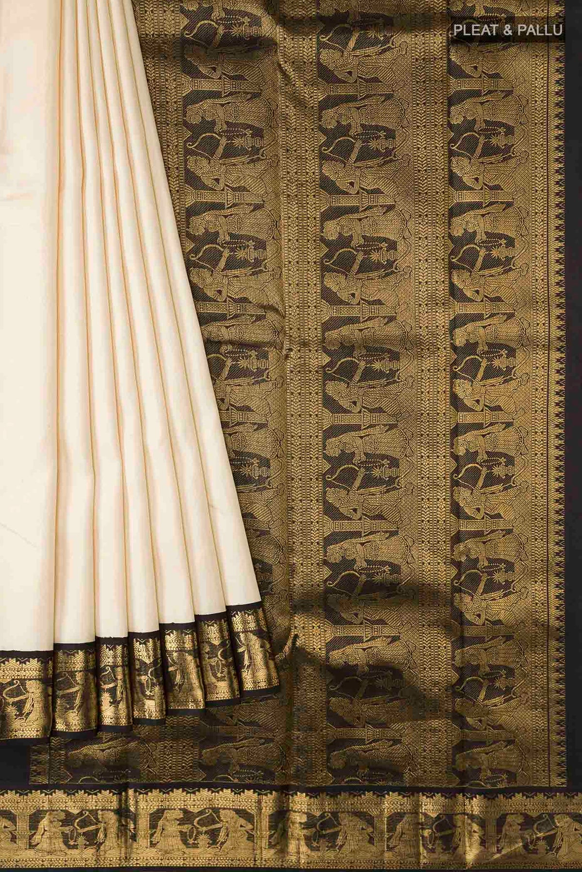 Pleats and pallu of Beige Kanchipuram Silk Saree with Plain Body and Zari Border