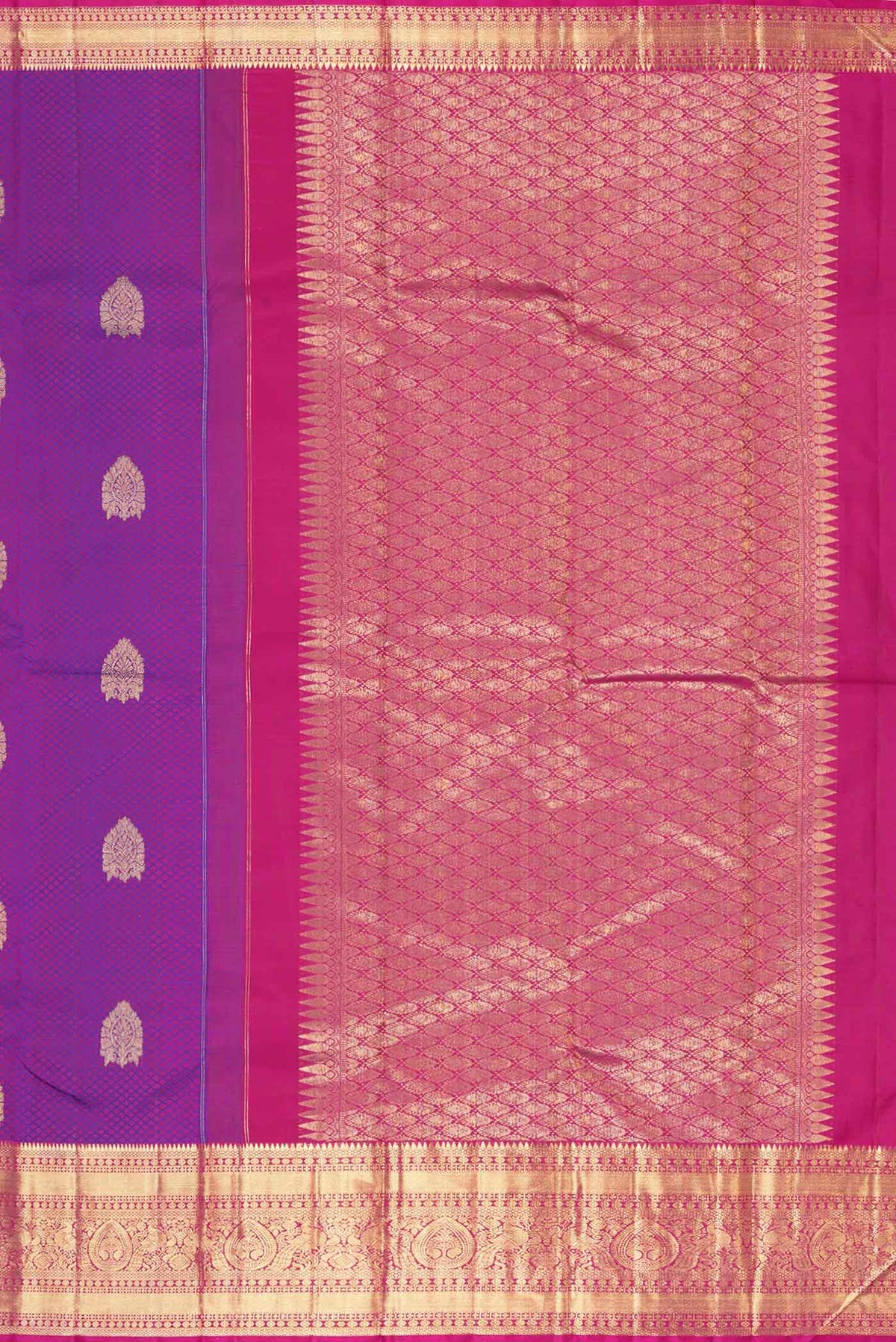 Close up image of the pallu of Purple Dual Tone Kanchipuram Saree with Jacquard With Zari Butta on the body and Zari Border
