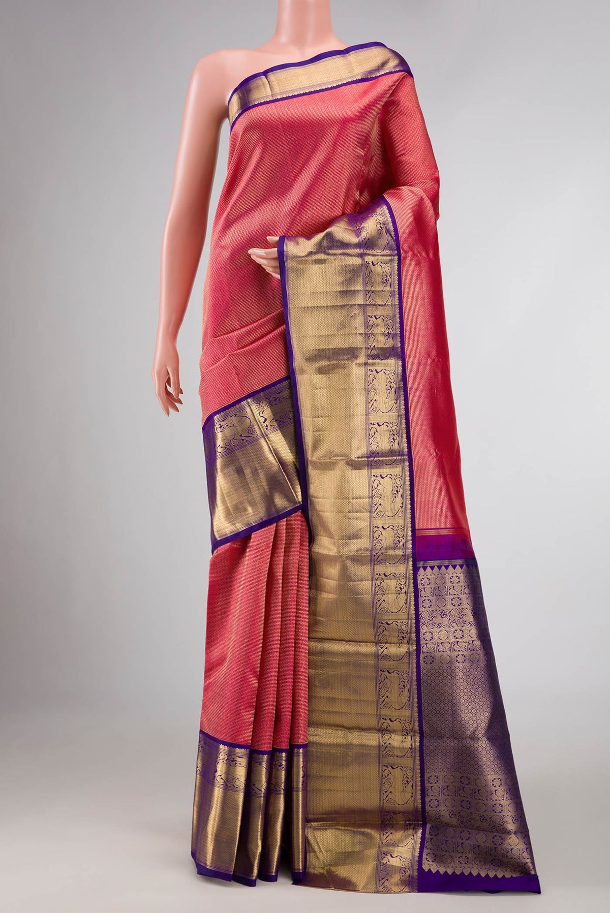 Dark Pink Dual Tone Kanchipuram Silk Saree with Zari Brocade on the body and Zari Border displayed on a mannequin