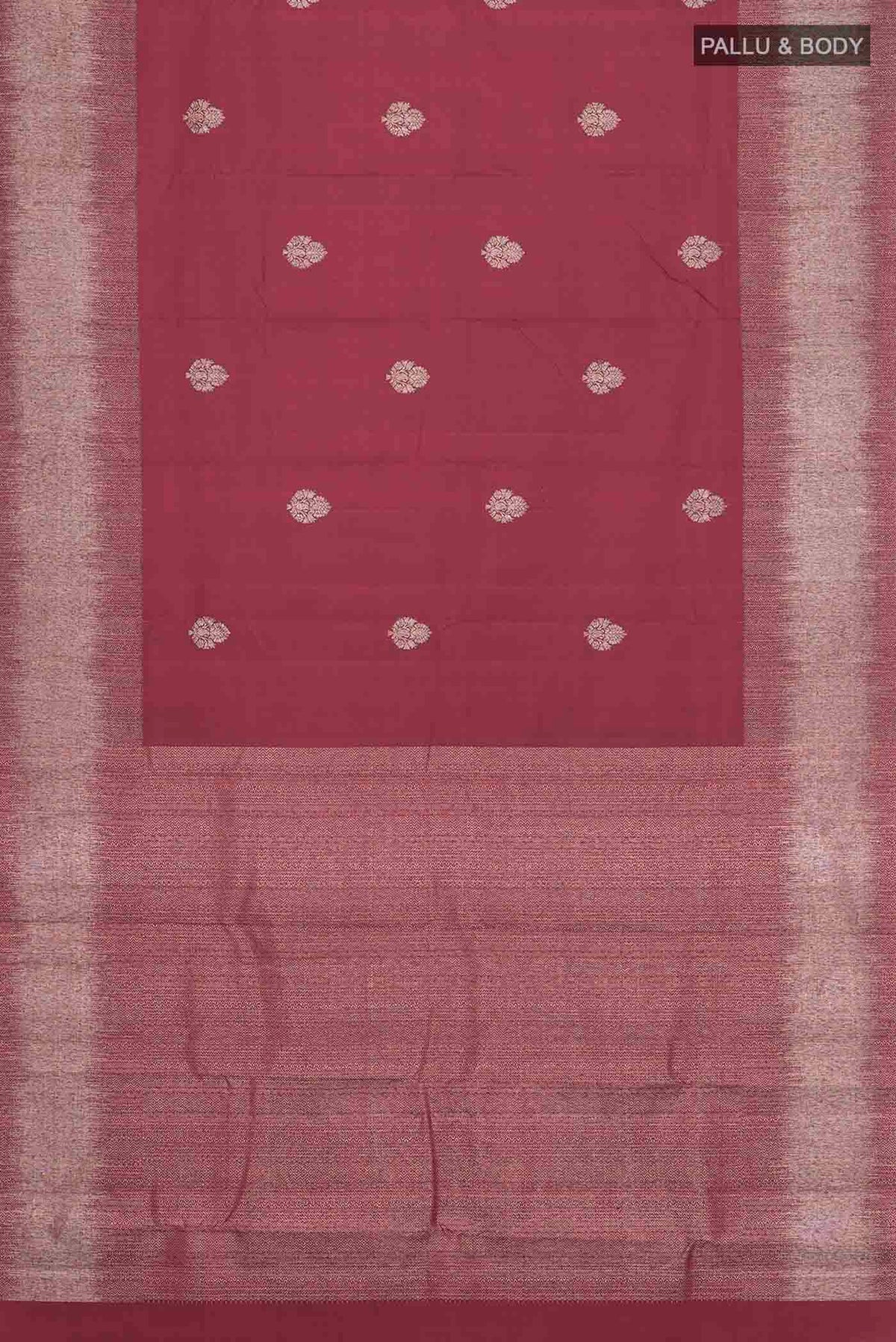 Flat view of Maroon Kanchipuram Silk Saree with Zari Butta on the body and Zari Border