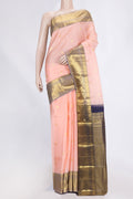 Golden Peach Dual Tone Kanjivaram Saree with Zari Butta on the body and Zari Border.  displayed on a mannequin
