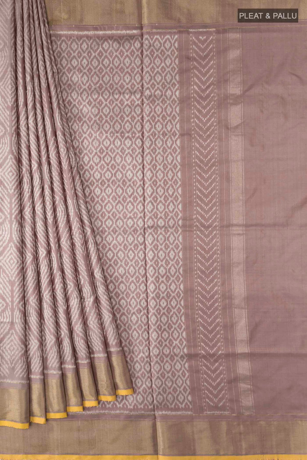 Pleats and pallu of Mauve Pochampally Silk Saree with Pure Ikat on the body and Zari Border