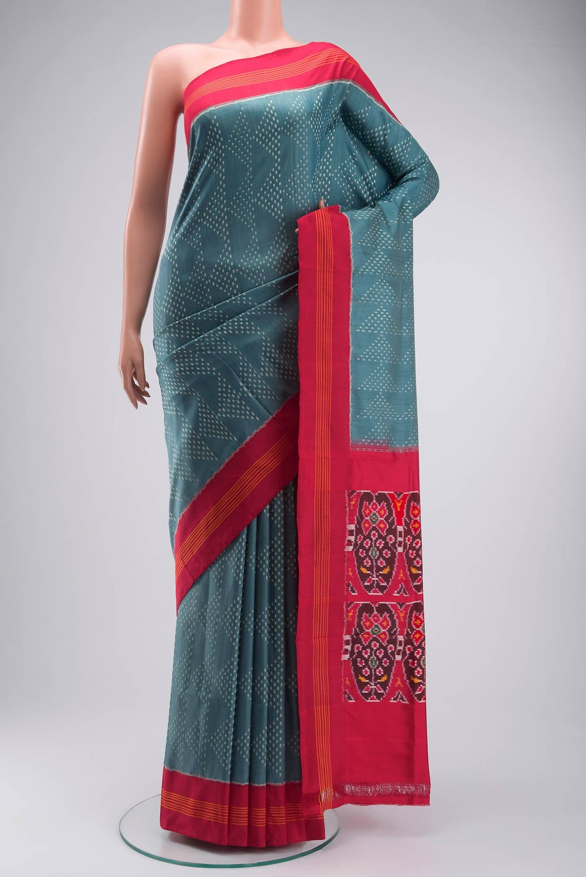 Grey Pochampally Silk Saree with Pure Ikat on the body and Plain Border displayed on a mannequin
