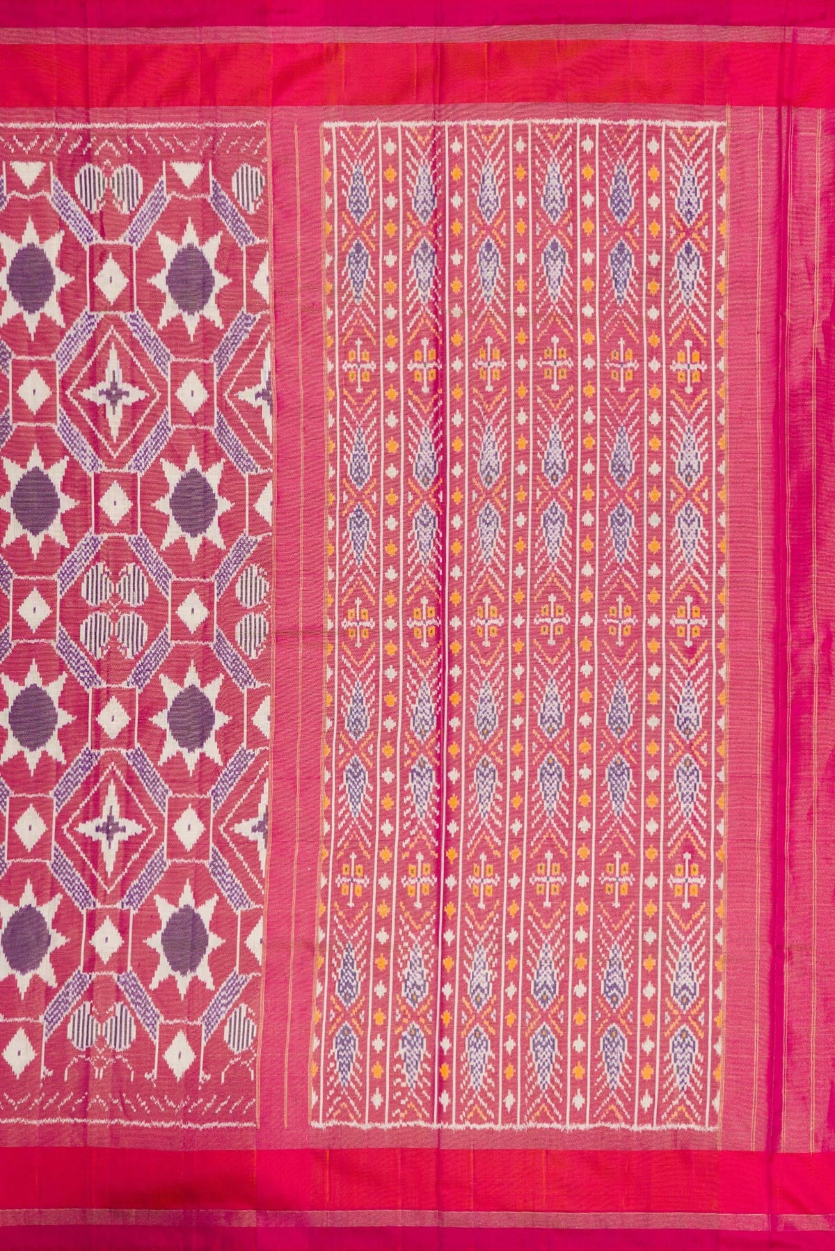 Close up image of the pallu of Pink Dual Tone Double Ikat Saree with Ikat Print on the body and Zari Border. 