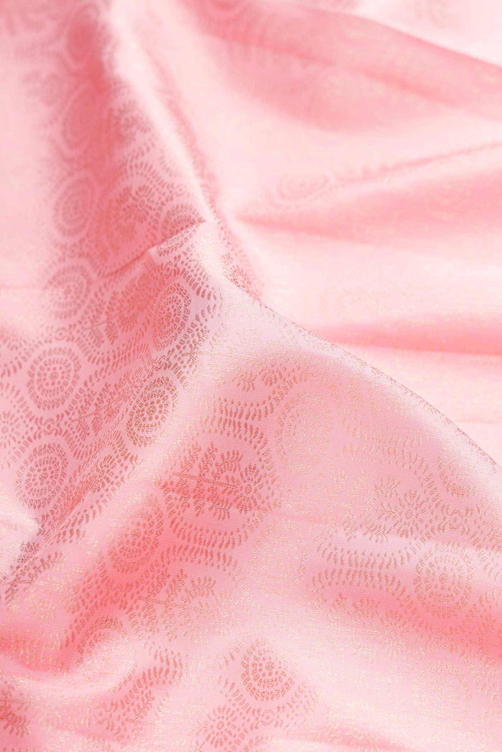 Close up of Rose pink Dual Tone Kanchipuram Silk Saree with Zari Brocade on the body and Zari Border displaying folds